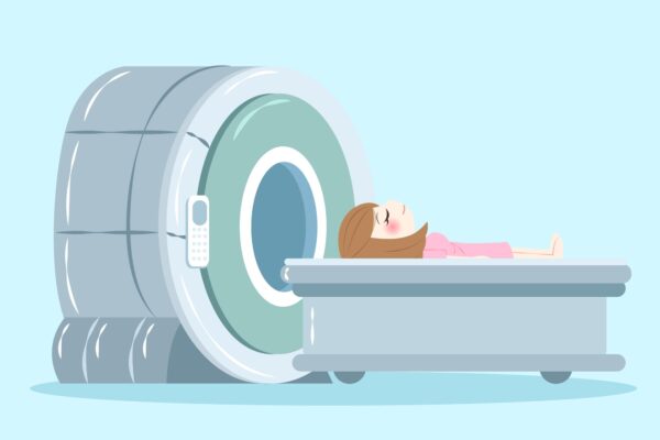 woman laying on MRI machine