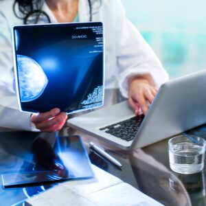 doctor reviewing mammogram