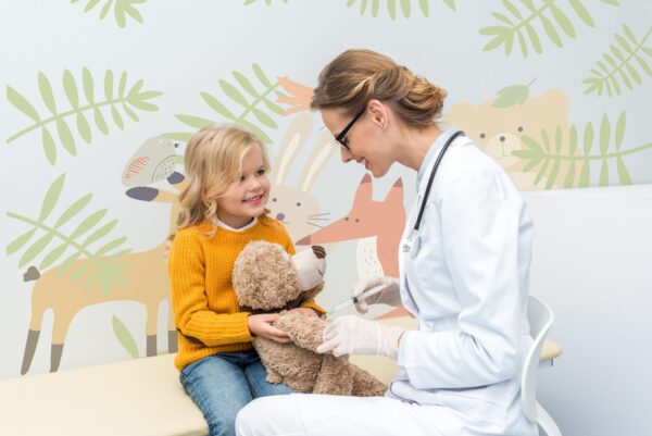 Doctor talking to a child